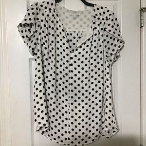 White polka dot blouse with tulip sleeves